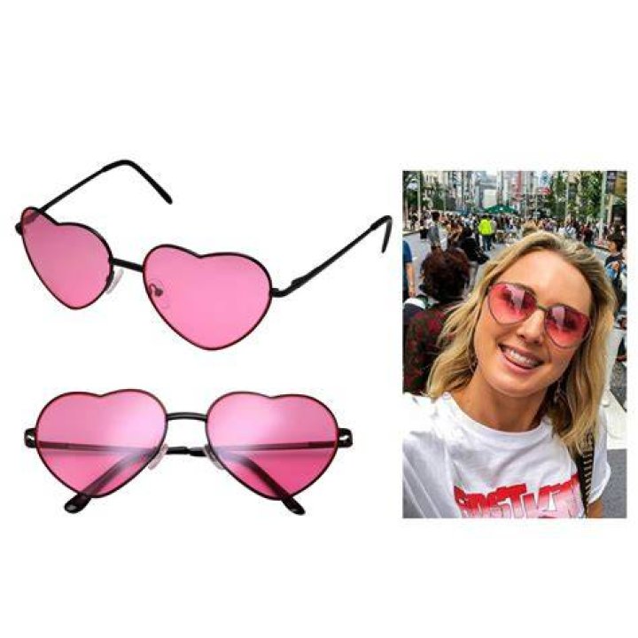 HeartShaped Pink Tinted Sunglasses of Alison Oliver as Catton in Saltburn (2023)