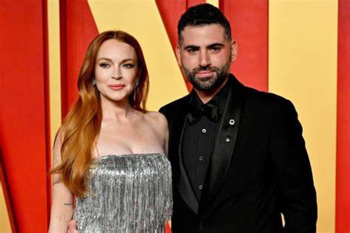 Lindsay Lohan Smiles with Husband Bader Shammas in London