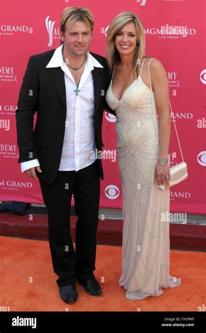 Singer Andy Griggs (L) and wife Renee Griggs arrive for the 43rd
