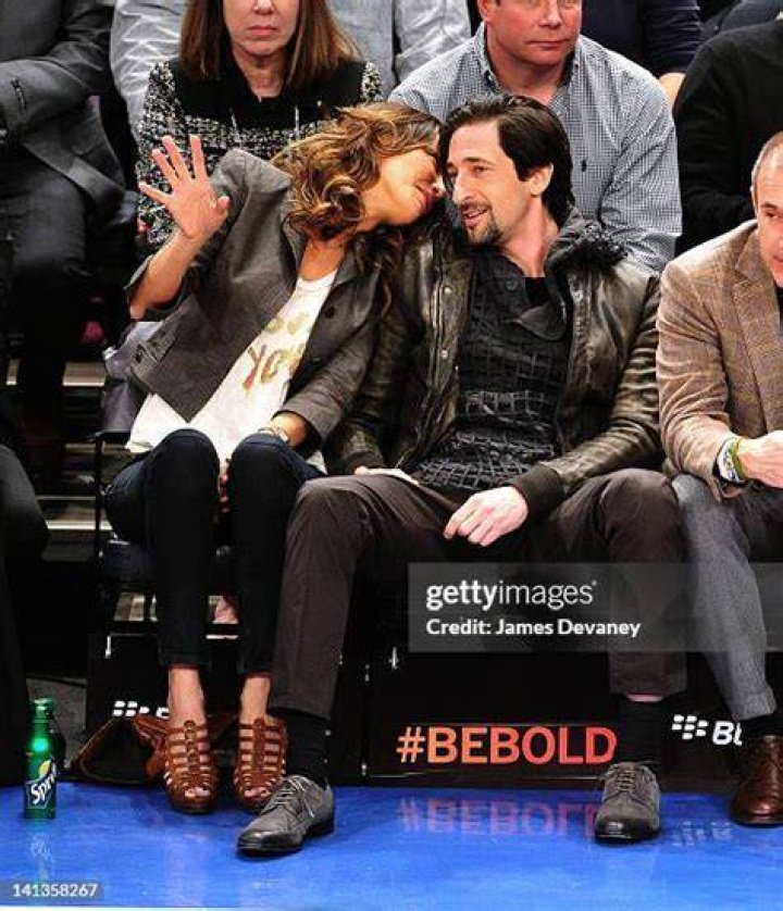 Sky Nellor and Adrien Brody attend the Portland Trail Blazers vs New
