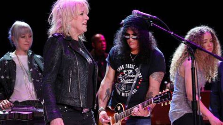 Slash and Lucinda Williams Make for Strange, Satisfying Bedfellows at